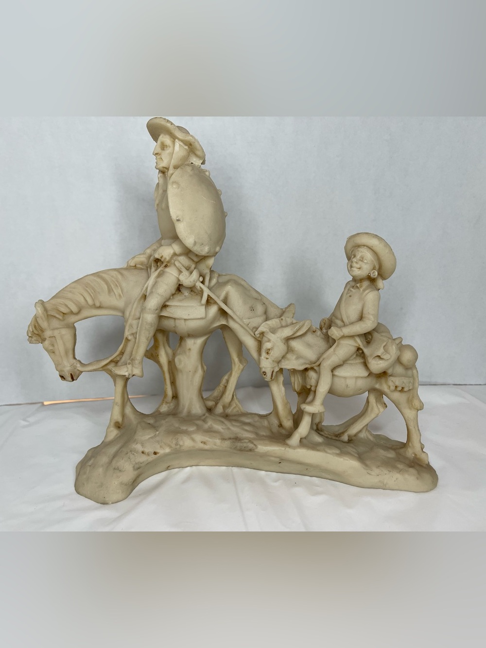 A. Santino Ivory-Colored Don Quixote and Sancho Panza Figurine Sculpture